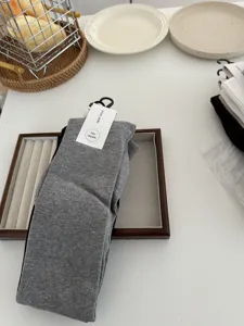 High elastic solid color over the knee socks ultra soft comfortable seamless design cozy wear.