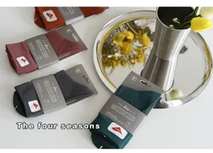 Solid color mid-tube socks with Lycra fabric for men and women, comfortable casual wear.
