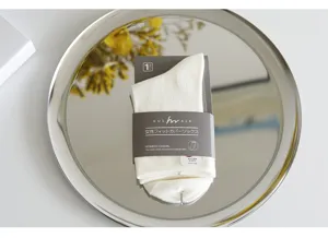 Solid color women's casual crew socks with Lycra fabric and neat packaging card. Perfect for daily wear.