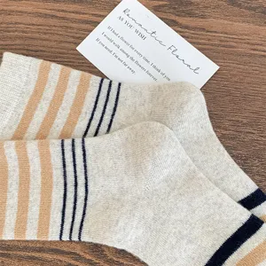 Chaussettes en laine rayées automne hiver pour femme, chaussettes thermiques épaisses.