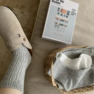Cozy grey cable knit mid-tube socks detail, soft autumn winter warm wool blend hosiery.
