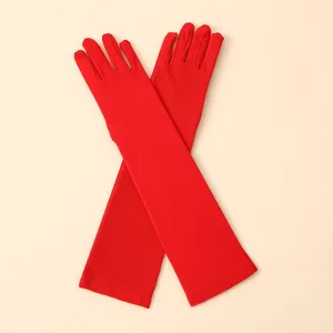 Long red stretchy milk silk gloves for party and holiday costume dress up accessories.
