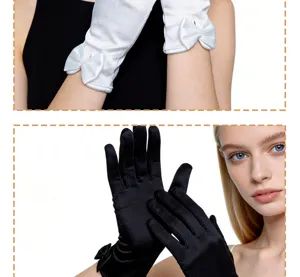 Detail closeup of bridal stretch satin formal gloves featuring delicate bows and pearl wrist accents.