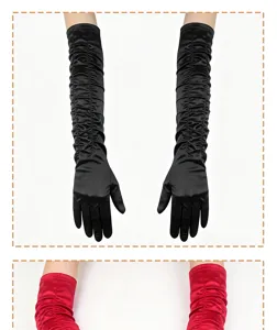 Close-up detail of long satin evening gloves featuring elegant pleated design and smooth fabric.