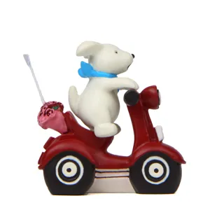 Cute white dog on red scooter miniature figurine, perfect gardening decor and photo prop.