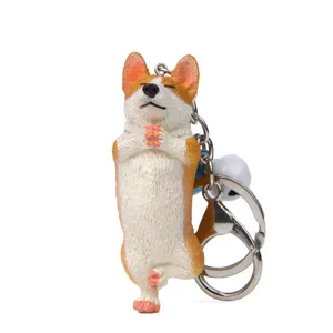 Niedlicher Yoga Corgi Schlüsselanhänger aus Kunstharz mit Metallring und hübscher Glocke.