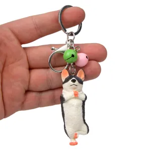 Süßer Yoga-Hund Schlüsselanhänger mit bunten Glocken Metallverschluss Detailansicht für Tasche