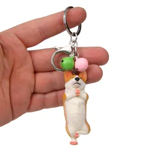 Schöner Yoga Corgi Schlüsselanhänger mit bunten Glocken und stabilem Metallring für Taschen.