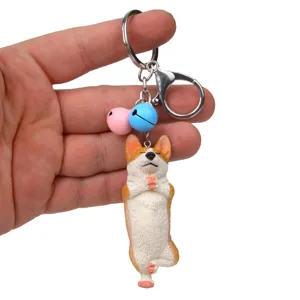Yoga Corgi Schlüsselanhänger mit Hundefigur, bunten Glöckchen und Metallkarabiner für Tasche.