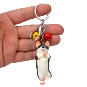 Niedlicher Yoga Hund Schlüsselanhänger mit bunten Glocken und Karabiner für Tasche.