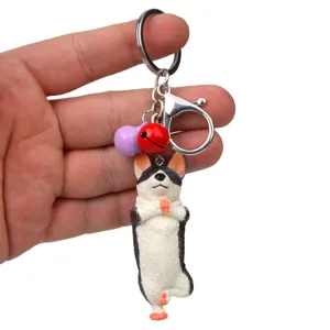 Yoga Hund Figur Schlüsselanhänger mit Karabiner und Glocke Detail für Autotasche.