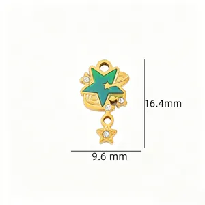 Detail view of the stainless steel star charm with green enamel and rhinestone accents.