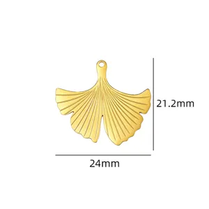 Detail shot of the gold ginkgo leaf pendant charm with size dimensions shown clearly.