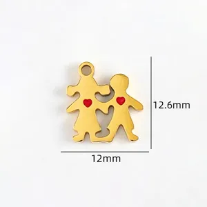 Gold boy girl charm pendant with red heart, metal DIY jewelry making accessory detail view.