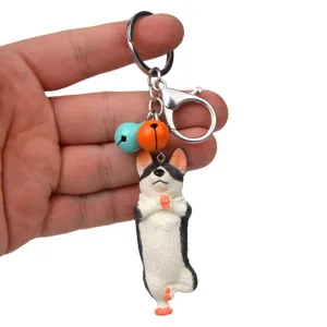 Niedlicher Yoga-Hund Schlüsselanhänger mit bunten Glocken und Karabiner, Detailansicht.