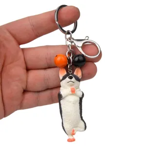 Niedlicher Yoga-Hund Schlüsselanhänger mit Glocken, Metallring und Karabiner für die Tasche.