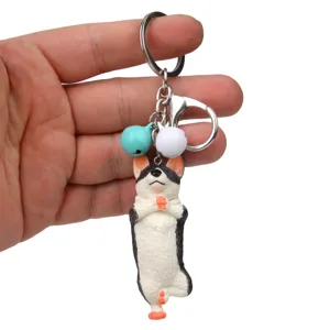 Süßer Yoga Hund Schlüsselanhänger mit kleinen bunten Glocken und Karabiner für Taschen.