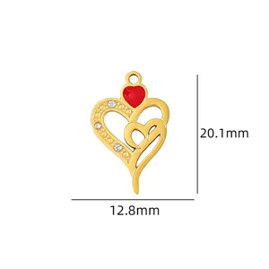 Gold heart pendant detail view with sparkling rhinestones and red enamel, ideal for DIY jewelry.