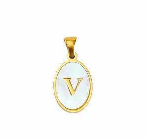 Detail shot of the elegant oval gold-plated pendant featuring white mother of pearl inlay and letter V.