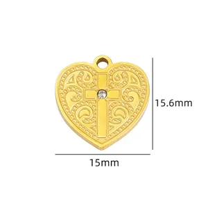 Gold heart pendant filigree cross DIY jewelry accessory craft component detail view