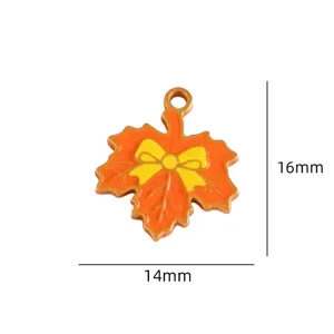 Fall maple leaf enamel pendant with bow, 16x14mm DIY jewelry making accessory detail.