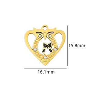 Gold owl heart pendant DIY jewelry accessory with crystal rhinestones detail shot.