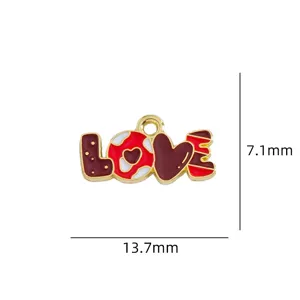 Enamel LOVE charm pendant for DIY jewelry making, gold plated metal accessory detail view.