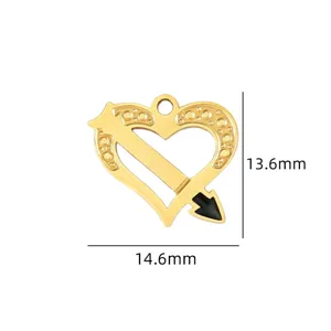 Gold-plated heart pendant detail, featuring an arrow through design and compact size.