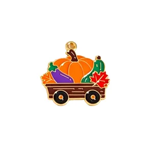 Enamel autumn harvest cart charm pendant with pumpkin and leaves for DIY jewelry making.