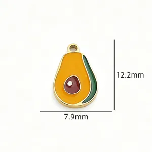 Close-up detail shot of cute avocado enamel stainless steel pendant charm component.