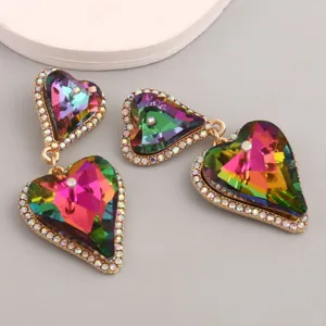 Detail view showing the vibrant multicolored faceted rhinestones on heart earrings.