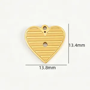 Gold stainless steel heart pendant with embossed lines, DIY jewelry making accessory detail view.