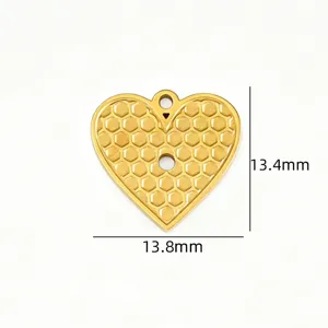 Detailed view of retro embossed heart 18k titanium steel pendant with honeycomb texture pattern.