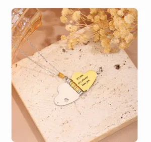 Stainless steel heart locket necklace detail, openable love letter pendant charm view.