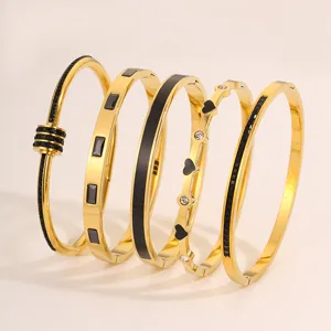 5er Set Edelstahl Gold Armreifen mit schwarzen Steinen und Zirkon, modischer Schmuck.