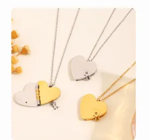 Openable heart book locket necklace in stainless steel, elegant couple jewelry detail view.