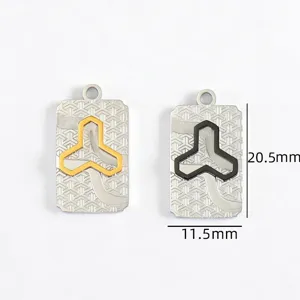 Stainless steel geometric pendant detail, textured oval jewelry charm showing dimensions.