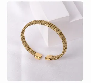 Gold titanium steel mesh cuff bracelet, exquisite open bangle detail display for women.