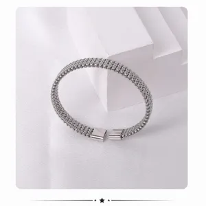 Silver mesh cuff bracelet detail shot, elegant titanium steel open design, premium daily jewelry.