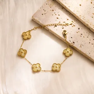 Exquisite five-leaf clover titanium steel bracelet, gold finish, luxury niche jewelry design.