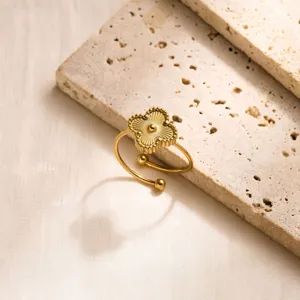 Exquisite gold stainless steel clover ring, elegant open adjustable ring for women daily wear.