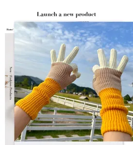 Color-block knit winter touch-screen gloves with extended cuffs for women daily wear.