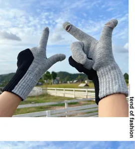 Detail view of color-block knit touchscreen fingerless gloves for outdoor winter warmth.