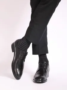 Men's striped business socks detail view showing stylish pattern and comfortable fit design.