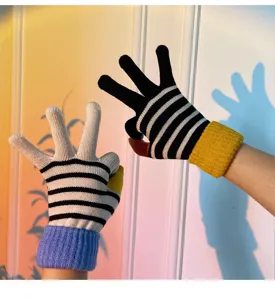 Detailed view of colorful striped knit touchscreen gloves featuring cozy ribbed cuffs for winter.