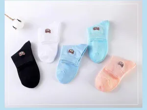 Detailed view of women's colorful summer short socks featuring cute bear embroidery design.