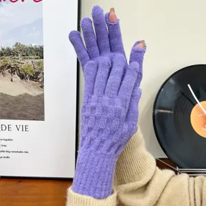 Detailed view of women winter purple knitted fingerless touch screen warm wool gloves on display.