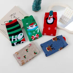 Christmas cotton mid-calf socks set with cute holiday patterns like santa and reindeer.