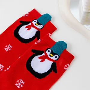 Christmas cotton mid-calf socks for women featuring cute 3D penguin pattern and snowflakes.