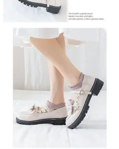 Detailed view of summer women thin crystal socks and sweet retro Mary Jane shoes styling.